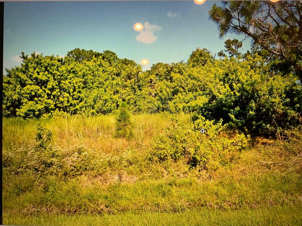 Photo of 5803 NW Culebra Avenue, Port Saint Lucie, FL 34986 (MLS # R10775526)