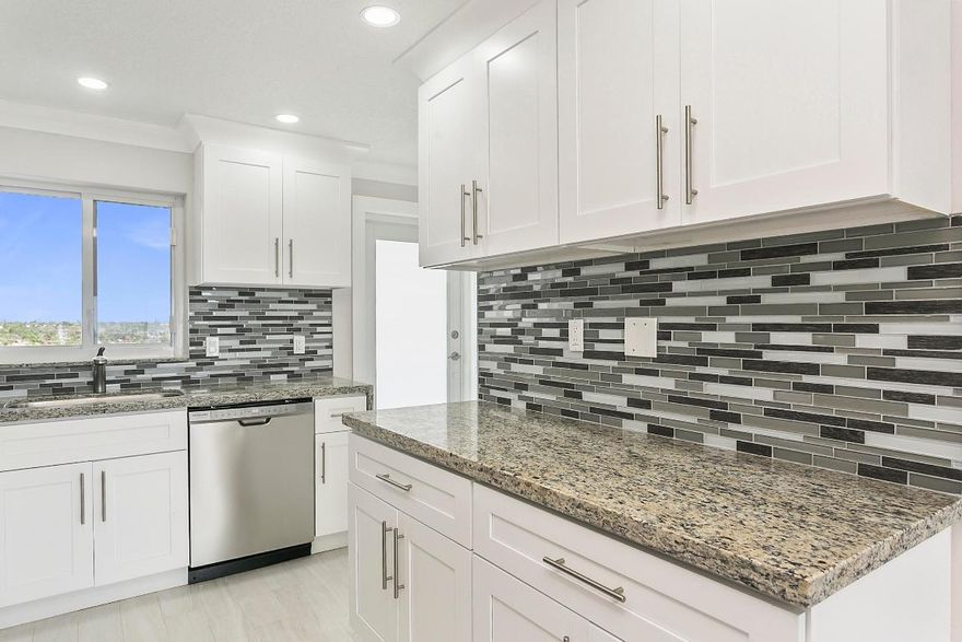 BRAND NEW CONDO DIRECTLY ON INTRACOASTAL WITH OCEAN VIEW! NESTLED IN LIGHTHOUSE POINT, THIS DEERFIELD BEACH PARCEL BOASTS AMAZING WATER VIEWS, OCEAN BREEZES, ZERO TRAFFIC AND A DAILY BOAT SHOW! COMPLETELY REMODELED TOP TO BOTTOM INCLUDING ALL NEW: IMPACT DOORS & WINDOWS, AC & APPLIANCES, CUSTOM KITCHEN & BATHS, WOOD PLANK TILE, LED LIGHTING & ELECTRICAL, DOORS & CROWN MOLDING, SHOWS LIKE A MODEL HOME. FREE BOAT DOCKAGE, LOW HOA AND ADJACENT TO DEGROFF PARK, MAKE THIS TRULY A UNIQUE HOME.