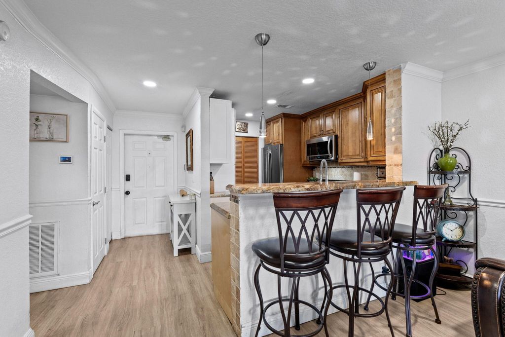 Photo of 1909 NW 94th Avenue #102a, Coral Springs, FL 33071 (MLS # B26029681)