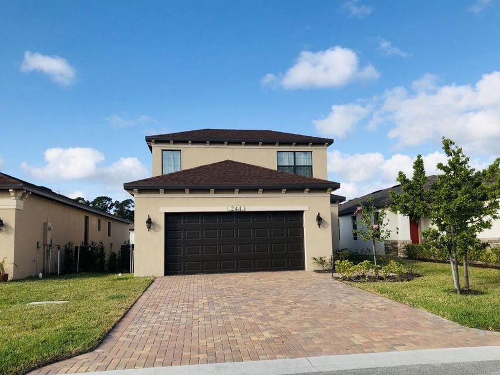 Photo of 244 SE Via Visconti, Port Saint Lucie, FL 34952 (MLS # R10800989)