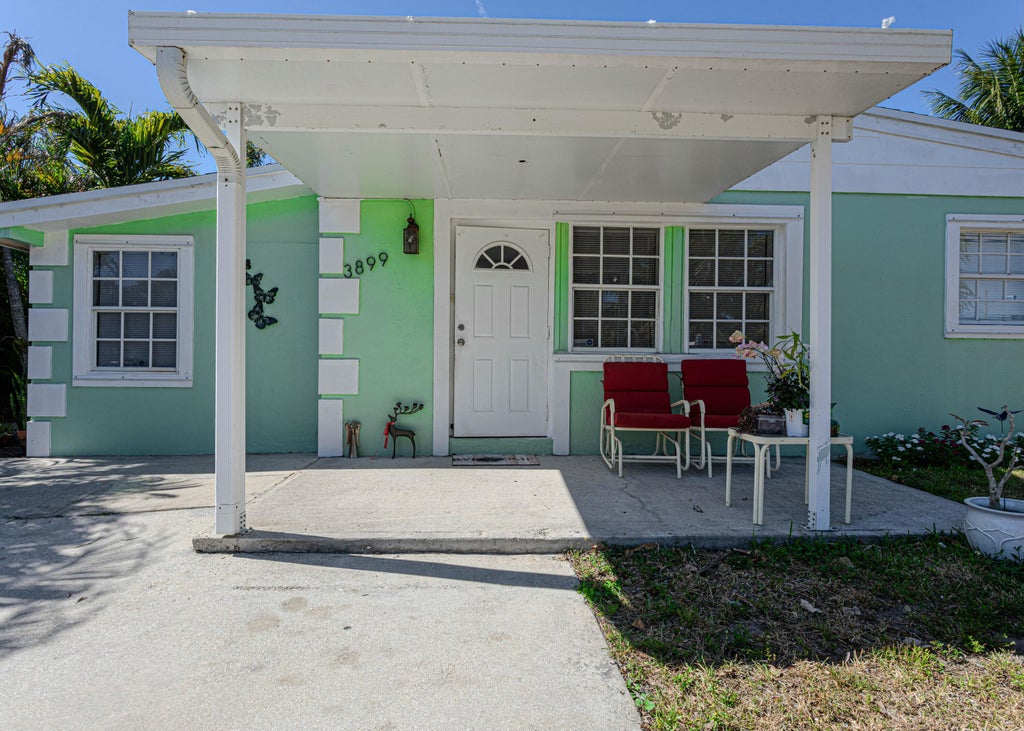 Photo of 3899 Tuskegee Drive, Lake Worth, FL 33462 (MLS # R11077407)