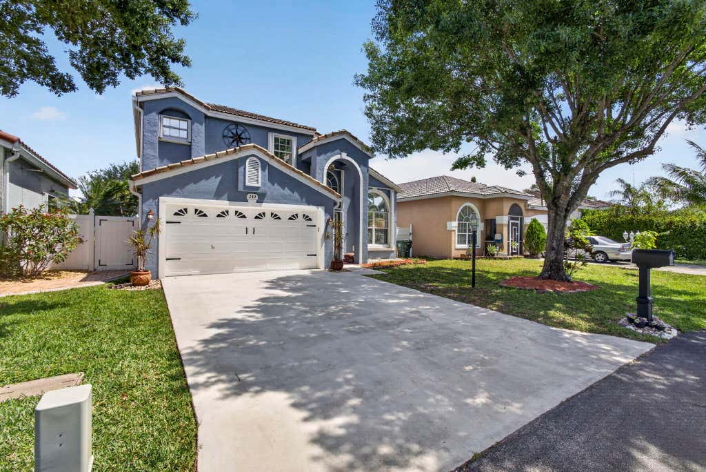 Photo of 243 WEDGEWOOD Circle, Greenacres, FL 33463 (MLS # B26061843)