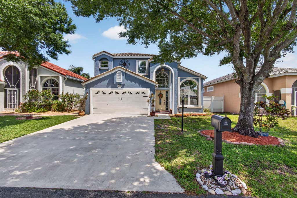 Photo of 243 WEDGEWOOD Circle, Greenacres, FL 33463 (MLS # B26061843)