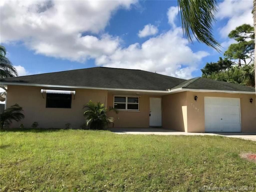 Photo of 2292 SE Holland Street, Port Saint Lucie, FL 34952 (MLS # R11146856)