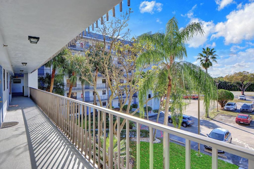 Photo of 4700 Lucerne Lakes Boulevard #301, Lake Worth, FL 33467 (MLS # R11157203)