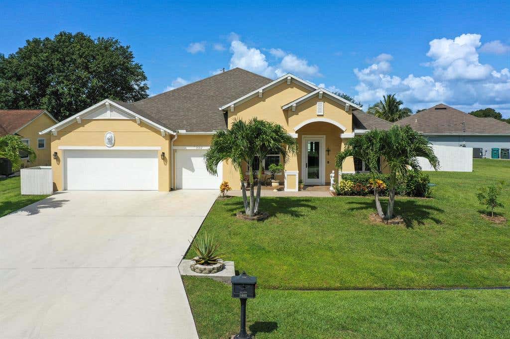 Photo of 1602 SW Hampshire Lane, Port Saint Lucie, FL 34953 (MLS # R10737883)