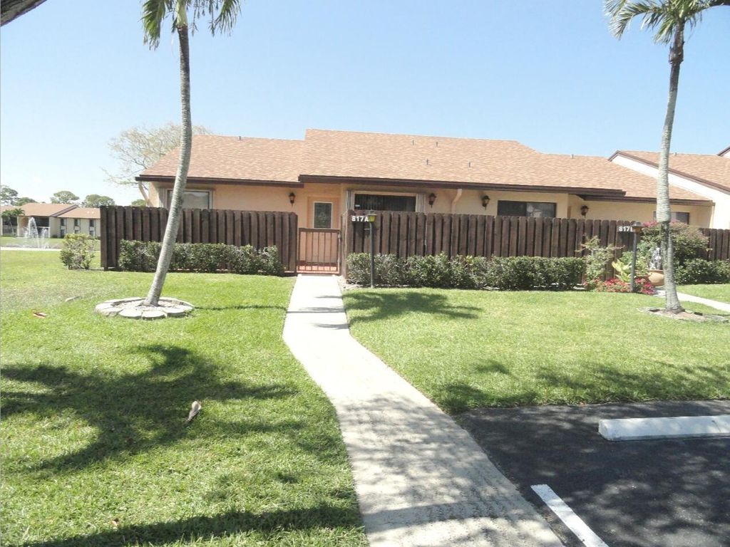 Photo of 817 Sky Pine Way #A, Greenacres, FL 33415 (MLS # R11081938)