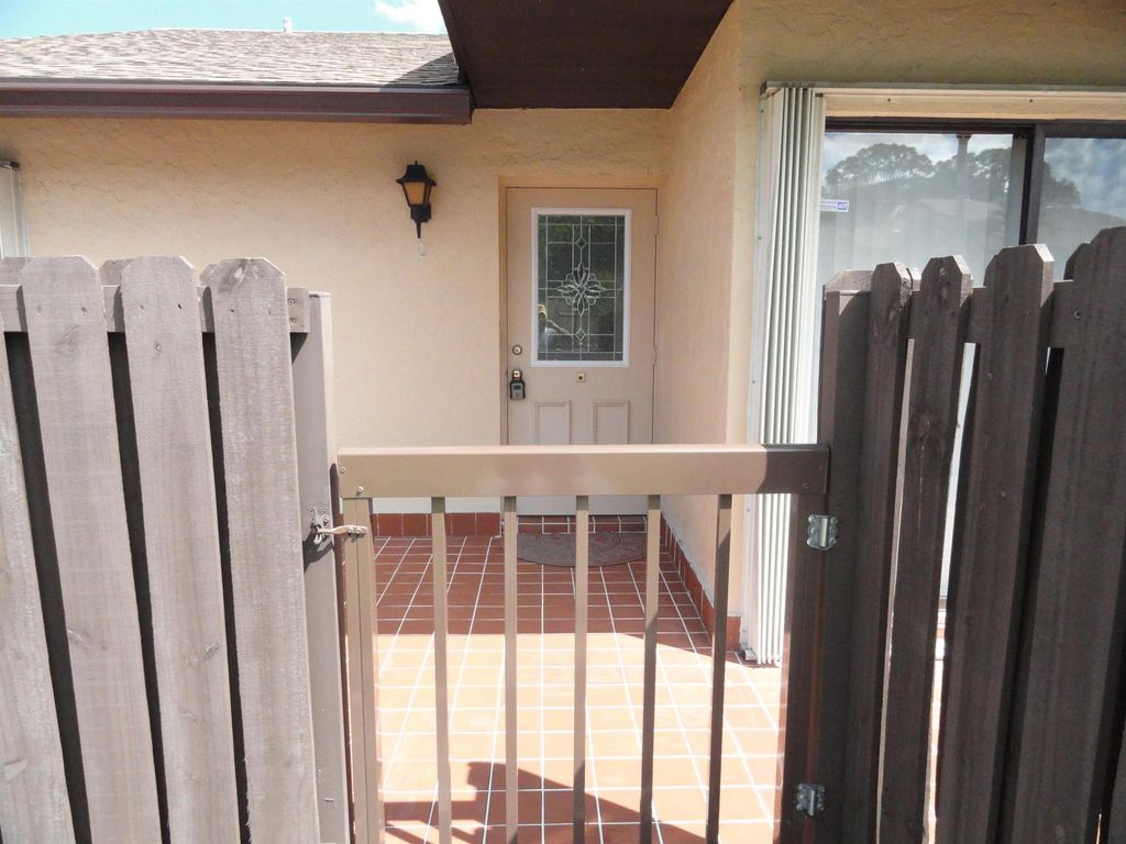 Photo of 817 Sky Pine Way #A, Greenacres, FL 33415 (MLS # R11081938)