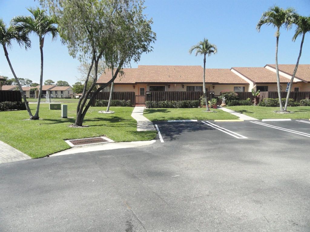 Photo of 817 Sky Pine Way #A, Greenacres, FL 33415 (MLS # R11081938)