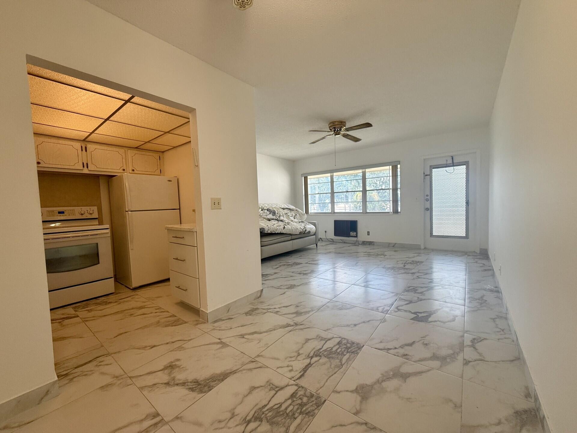 Fantastic second floor, 1 Bedroom & 1 bath rental with Updates in 55+ Century Village! This immaculate unit is cute as a button! This open and airy unit features gorgeous ceramic tile flooring, updated bath & kitchen. Long Screened Lanai With Greenspace View. Wonderful location near the Clubhouse and the Haverhill Gate. Century Village Is A 55+ Community with So Much to Offer..