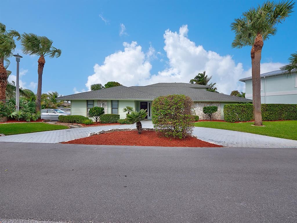 Photo of 461 S Juno Lane, Juno Beach, FL 33408 (MLS # R10672646)