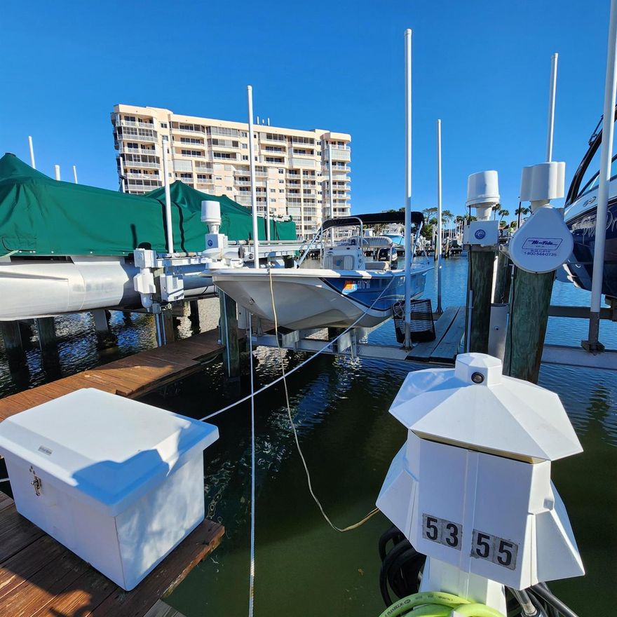 SOUTH CORNER UNIT WITH SMALL BOAT SLIP/LIFT INCLUDED! Furnished, wrap balcony, tile throughout and gorgeous water-marina-tropical views! New water heater, AC 2023, Solid wood cabinetry with beachy corian counter tops and seamless double sink, upgraded Samsung appliances includes a slide in stove, bottom freezer/refrigerator. Boat slip has an older 9,000lb lift. Measurements within the bare slip are approximately 10' x 25'. BOAT AVAILABLE FOR $3,800!Community has 550'+/- private beachfront, 100 slip Marina, two clubhouses/pools/tennis/pickleball/sauna and abuts 600+/- acre State Preserve! Close proximity to Fort Pierce Inlet fishing, Vero Beach Ocean Drive shopping, theaters, Farmers Market. I challenge you to find another all-inclusive beach/boat community