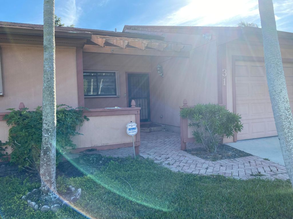 Photo of 31 Walcott Drive, Boynton Beach, FL 33426 (MLS # R10939889)