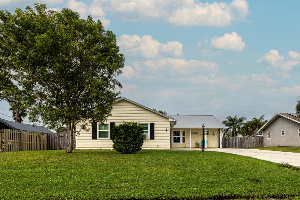 Photo of 1190 SW Cynthia Street, Port Saint Lucie, FL 34983 (MLS # R11035225)