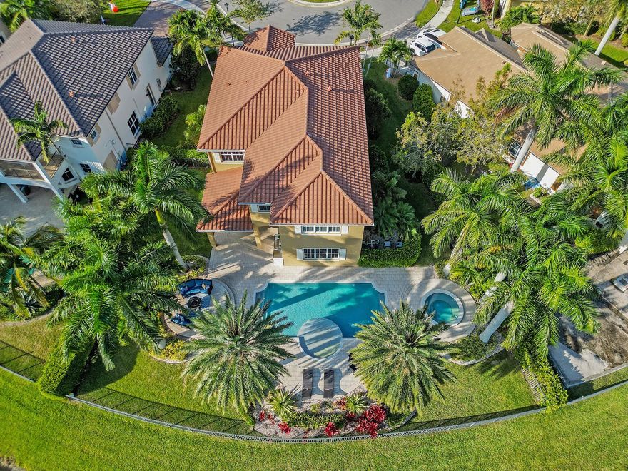 Gorgeous former stunning model! This Waterton over 4,064 square feet is largest home in the Executive collection on a point water lot on model row in beautiful MiraLago. This home is superbly upgraded with all the bells and whistles, has 5 Bedrooms (one down) and 4 full baths. Large living room, formal dining, built in bar and family room make this the perfect home for entertaining. Large primary suite with sitting area. Very generous sized upstairs game room. Enjoy sunrise and sunset in your backyard sanctuary on over 110 feet of lake frontage. Spectacular pool with separate spa and several seating areas, outdoor kitchen and green spaces. Amazing gated community; resort-style amenities, including gyms, tennis, spin room, basketball, billiards room, tot lots, kids Water Parks and ballroom.