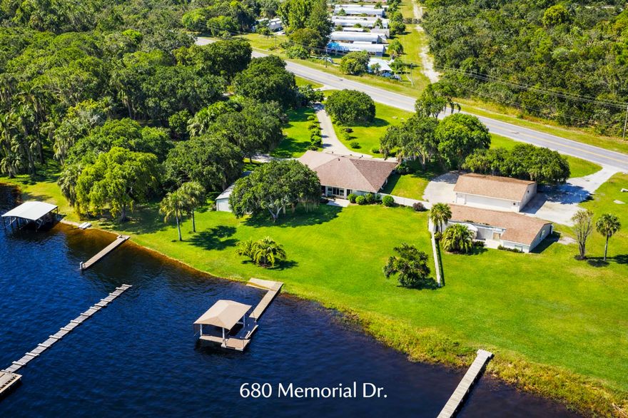 680 Memorial Drive, Sebring - This beautiful home is very well cared for, fairly priced, and the seller is open to reasonable offers. Any renderings shown simply reflect ideas for future possibilities, not current condition. The home is set along the calm edge of Lake Sebring, this is a home that feels easy the moment you arrive. With 144 feet of water frontage and your own private boat lift, the lake becomes part of daily life, not just a view. A sweeping drive welcomes guests with space and grace. Inside, sunlight moves freely through open living areas designed for comfort and quiet enjoyment. The kitchen is practical and inviting, centered by an island that naturally gathers conversation.  The primary suite is set apart in its own wing, complete with a private entrance, offering a sense of retreat rarely found. Two additional bedrooms share a generous bath with a soaking Jacuzzi and separate shower, each room filled with natural light.    Whether you are starting a new chapter, seeking a weekend escape, or considering a refined short-term rental investment, this property offers both flexibility and presence.    The sellers are simply moving north for retirement, creating an uncommon opportunity to secure a true lakeside home in Sebring, where life slows just enough to be enjoyed.   Convenient to SR66, yet peacefully removed from the rush, this is the kind of place people come to see, and stay longer than planned. All are welcome.