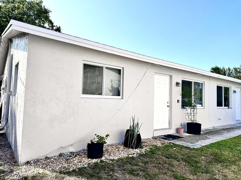 Photo of 3496 48th Lane S, Lake Worth, FL 33461 (MLS # R10960960)