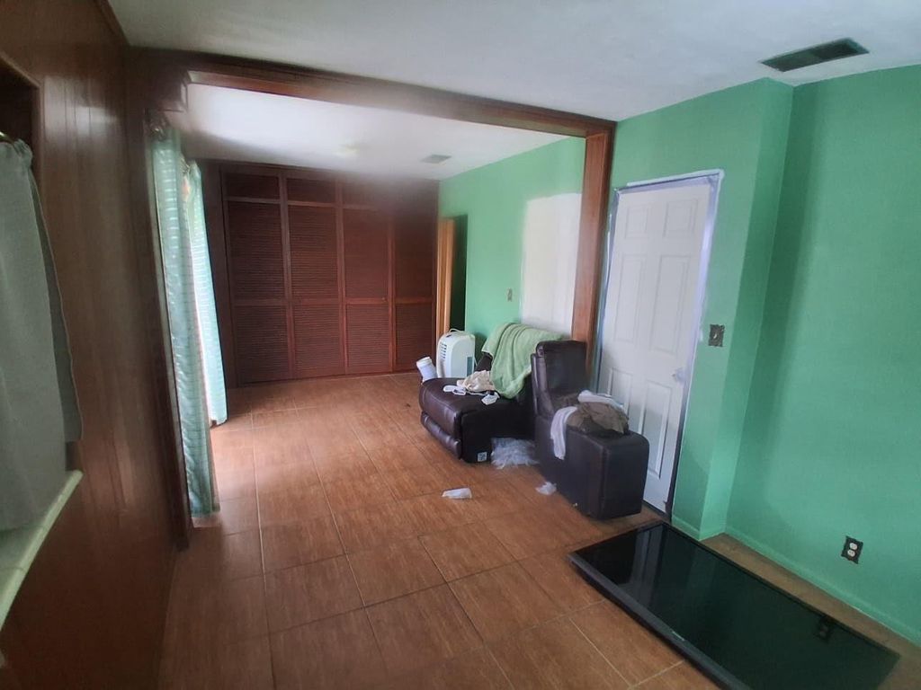 Photo of 6031 NE 7th Avenue, Oakland Park, FL 33334 (MLS # F10551318)