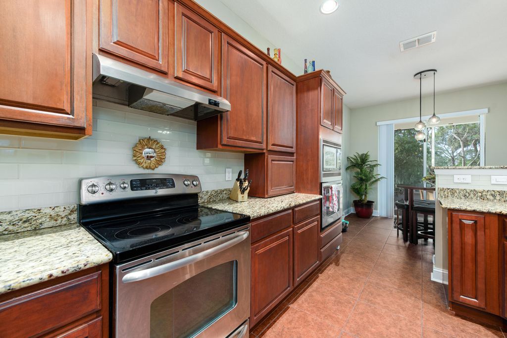 Photo of 6128 NW Butterfly Orchid Place, Port Saint Lucie, FL 34986 (MLS # B26013287)