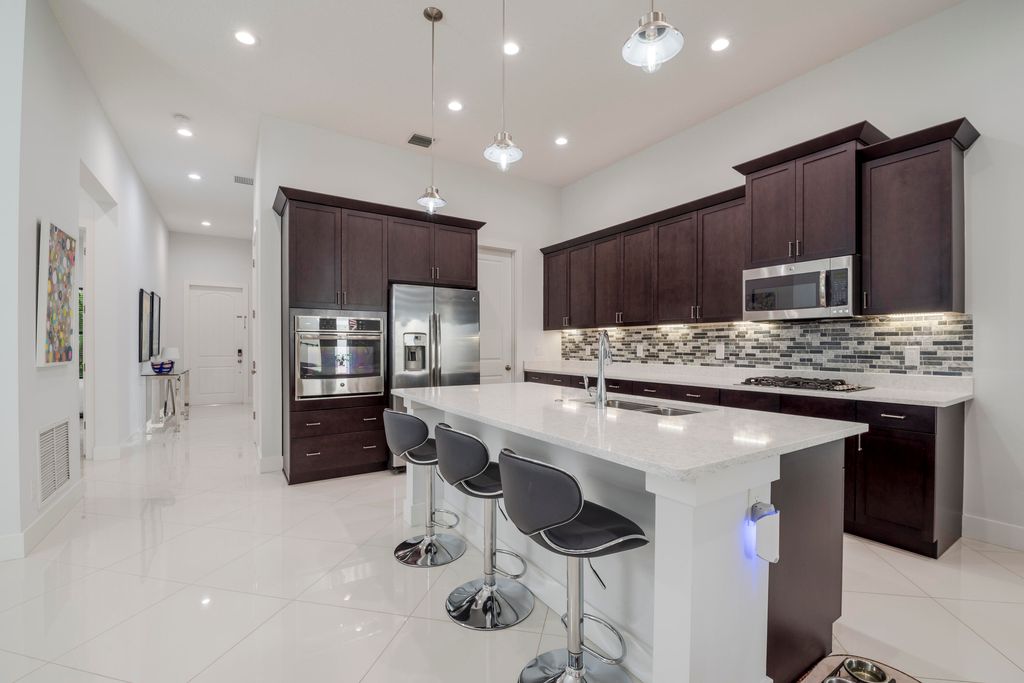 Photo of 5033 Grandiflora Road, Palm Beach Gardens, FL 33418 (MLS # R10926221)