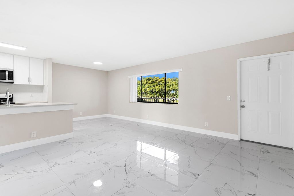 Photo of 712 Meadows Circle, Boynton Beach, FL 33436 (MLS # B26028969)