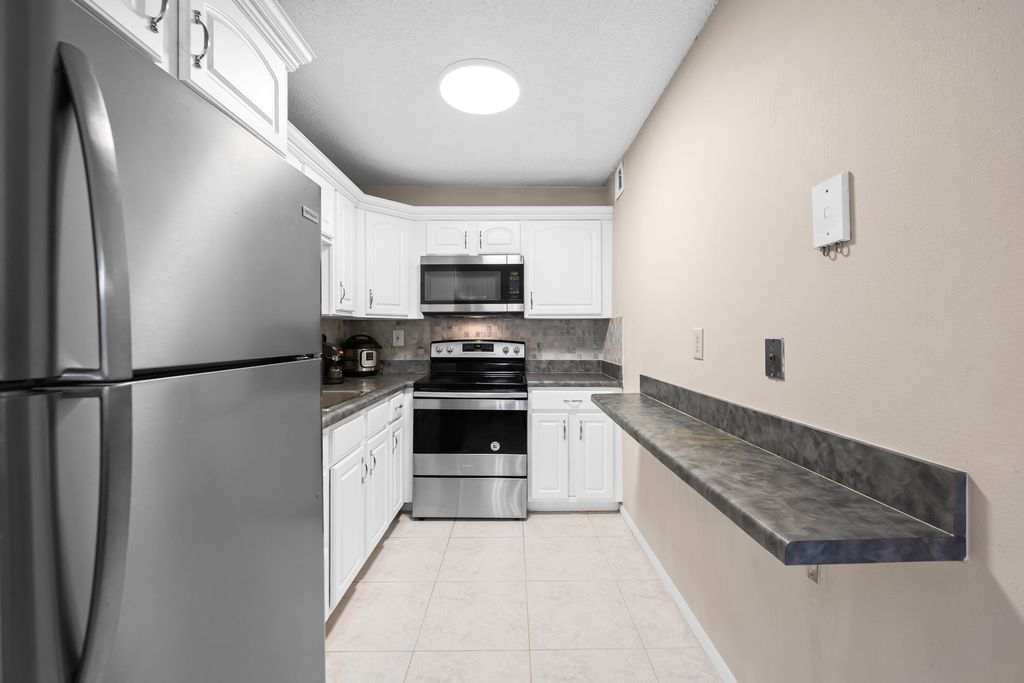 Photo of 5180 E Sabal Palm Boulevard #239, Tamarac, FL 33319 (MLS # R11165055)