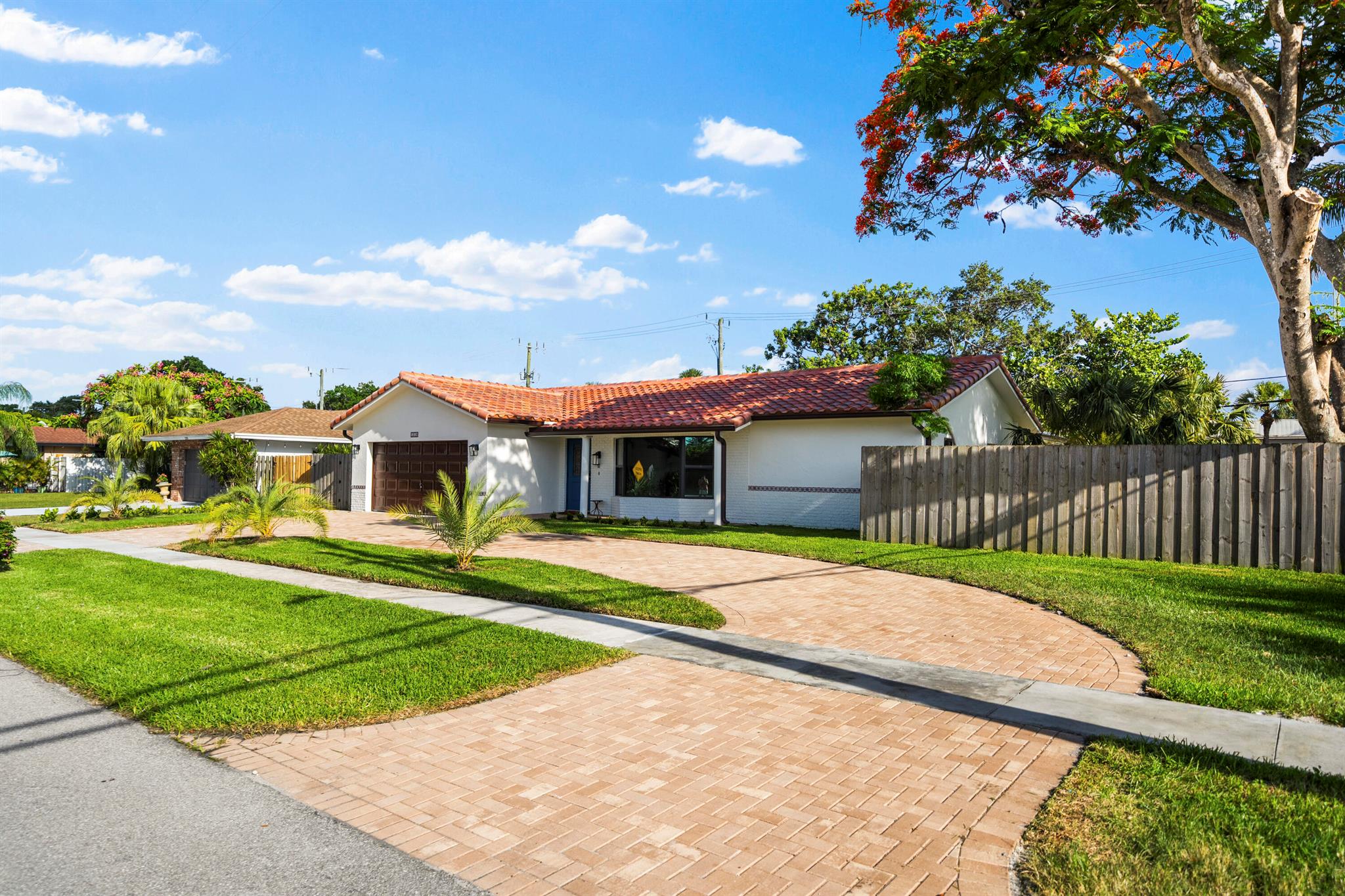 One of a kind, Double Lot property In East Boca Raton. True 4/3 Spanish Villa Style Ranch on 14,000sqft lot. Rarely available space and privacy, this home gives endless possibilities, and is perfect for your next chapter. Totally remodeled; 2024 Roof, Pool & Circle Driveway. Brand new sod, sprinklers, and landscape. 2023 AC. 2022 Impact Windows. 2020 Kitchen & Bathrooms. No HOA. Double wide Garage. No restrictions. Walk to AAA School Districts. Walk to markets, parks, gardens. 2 miles from the Beach.