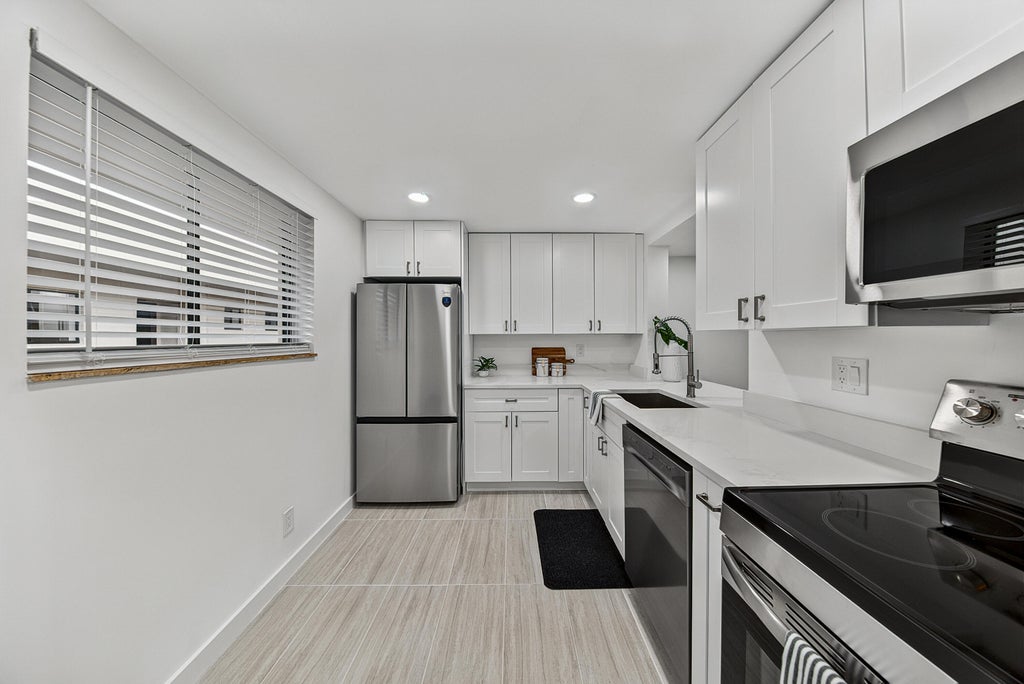 Photo of 5220 Las Verdes Circle #317, Delray Beach, FL 33484 (MLS # B26029487)