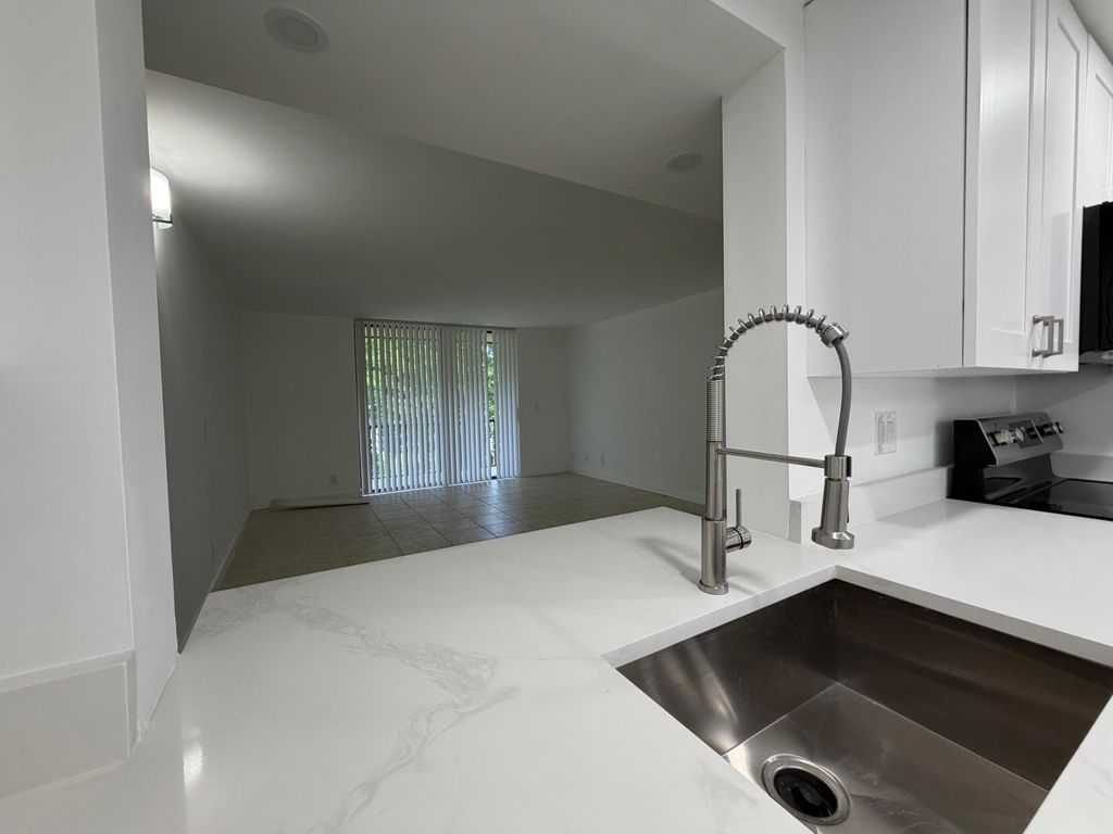 Photo of 5220 Las Verdes Circle #317, Delray Beach, FL 33484 (MLS # B26029487)