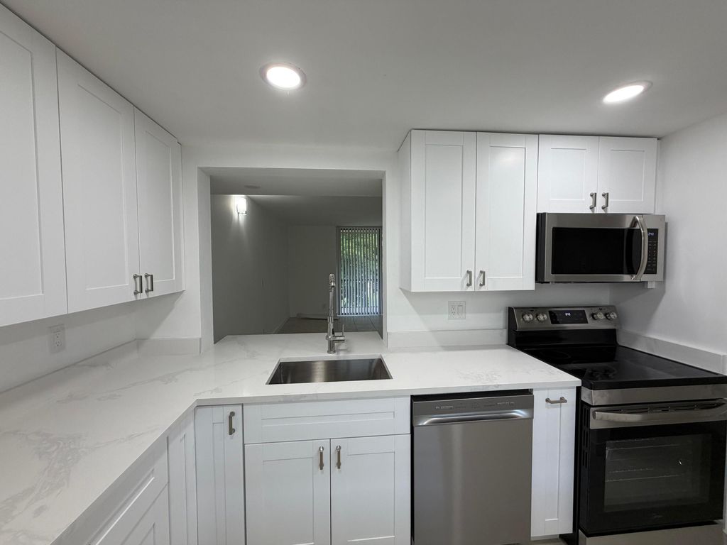 Photo of 5220 Las Verdes Circle #317, Delray Beach, FL 33484 (MLS # B26029487)
