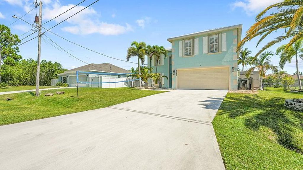 Photo of 2685 SW Fair Isle Road, Port Saint Lucie, FL 34987 (MLS # R11112677)