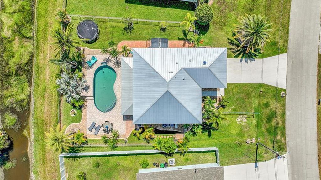 Photo of 2685 SW Fair Isle Road, Port Saint Lucie, FL 34987 (MLS # R11112677)