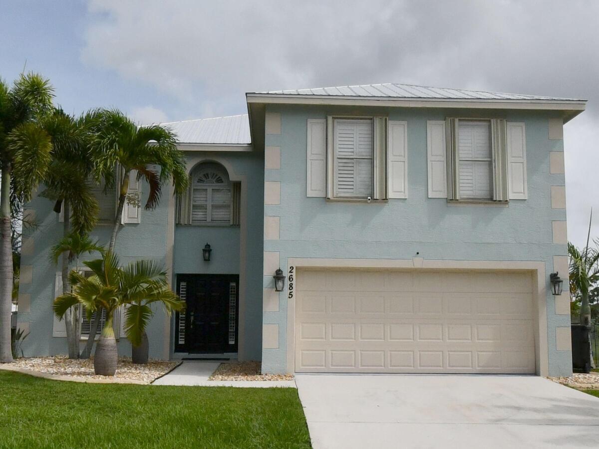 Do not miss this Turn-Key incredible Single Family home. Beautiful two story pool home with both covered and screened porch as well as a large lanae. 20'' ceramic tile, granite countertops, granite marble backsplash, double pantry and kitchen island with outlet for convenient outdoor cooking. The house is also equipted with many spacious closets and storage. The windows have Plantation Shutters throughout the house which they are known for their classic, timeless aesthetic and are often used to enhance the beauty and value of homes. Beyond aesthetics, they offer practical benefits like light control, privacy, and even noise reduction as well as thermal insulation. Just 5 minutes away from Publix shopping center and I-95. More photos coming soon.