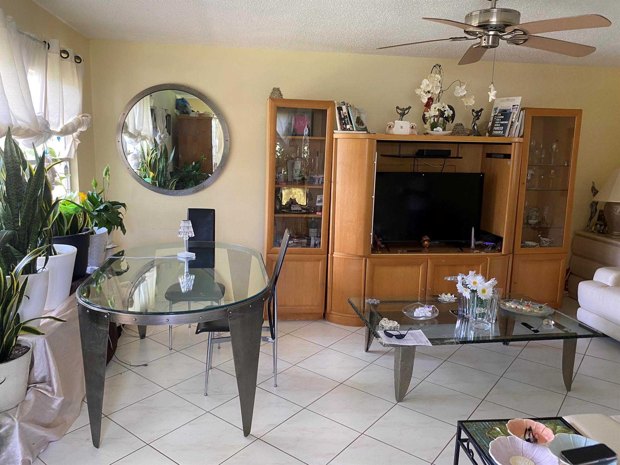 Century Village is one of the best 55+ communities in Boca Raton. Here you will experience a resort style of living. beautiful club house, weekend shows, weekly movies, monthly events and all kinds of activity rooms, inside pool, sauna and more. They also provide a courtesy bus to take you to near by stores, shopping and restaurants. Great location.This is a 2 bedrooms, one full bath and half bath . corner unit. you can live here or you can Also rent it if you want. this unit can be rented immediatly