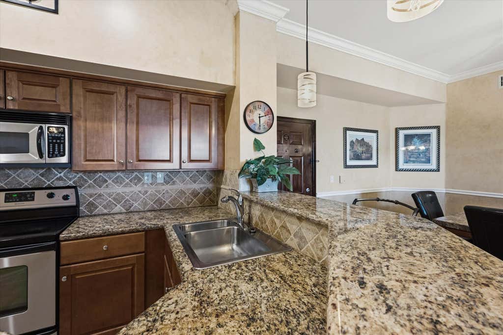 Photo of 11750 SAINT ANDREWS Place #303, Wellington, FL 33414 (MLS # B26066361)