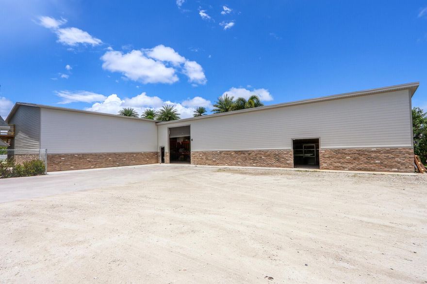 Warehouse along with 50 x 20 shed with fully fenced lot on stone yard for plenty of parking. Warehouse offers 18ft max clearance on ceiling.  Ideal for landscapers or contractors.