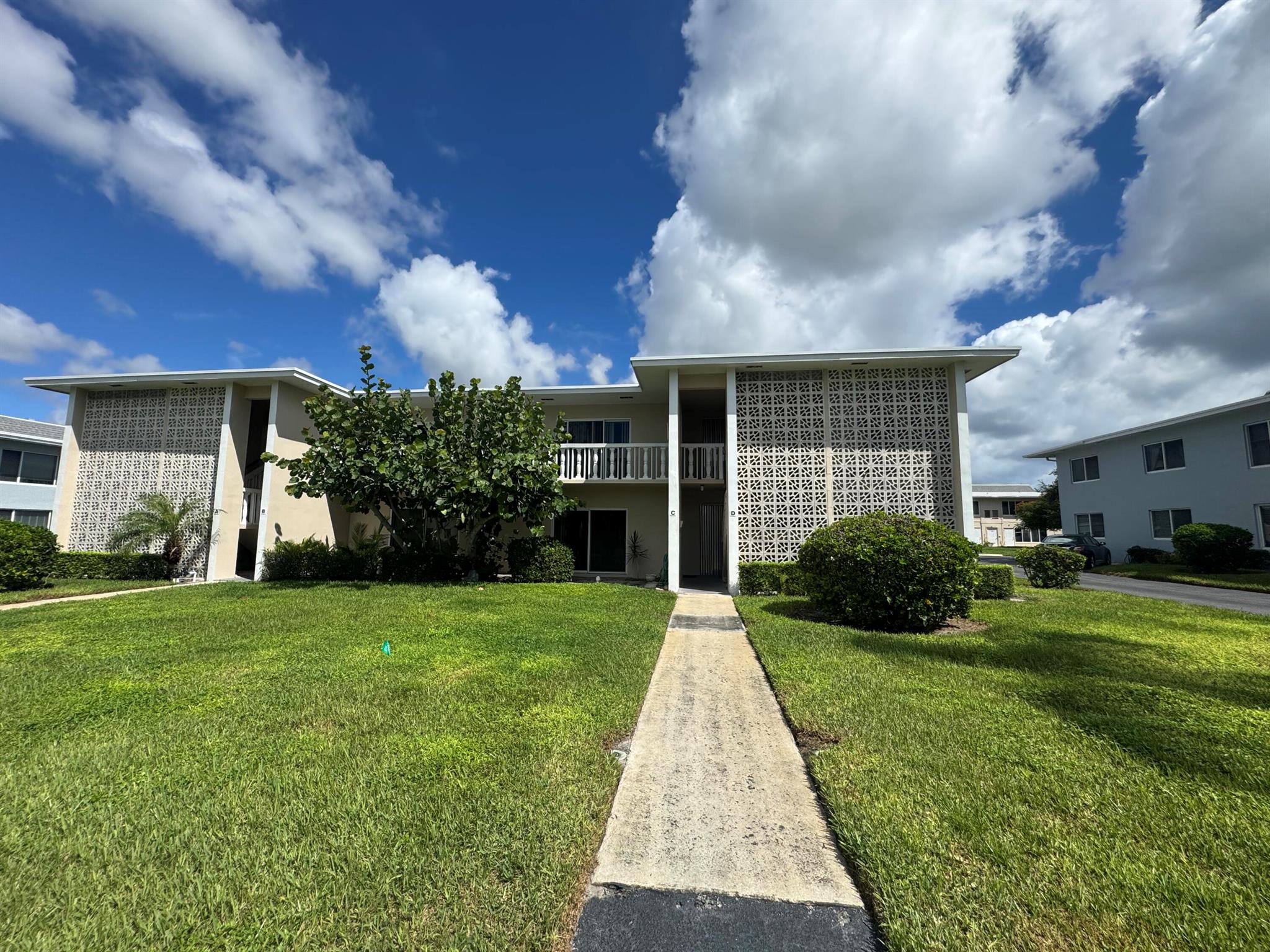 First-floor condo featuring an updated kitchen with dishwasher and trash compactor, updated bathroom with a separate vanity area. This well-kept seasonal residence offers two walk-in closets, impact windows, and newer A/C (2020). Enclosed Patio makes a great flex space. Currently used as guest space. Conveniently located in an east Boynton Beach location, close to the beach, dining, and shopping. Priced for a quick sale, this home provides great value for the area.Dues include water, trash, building insurance, cable, and internet.
