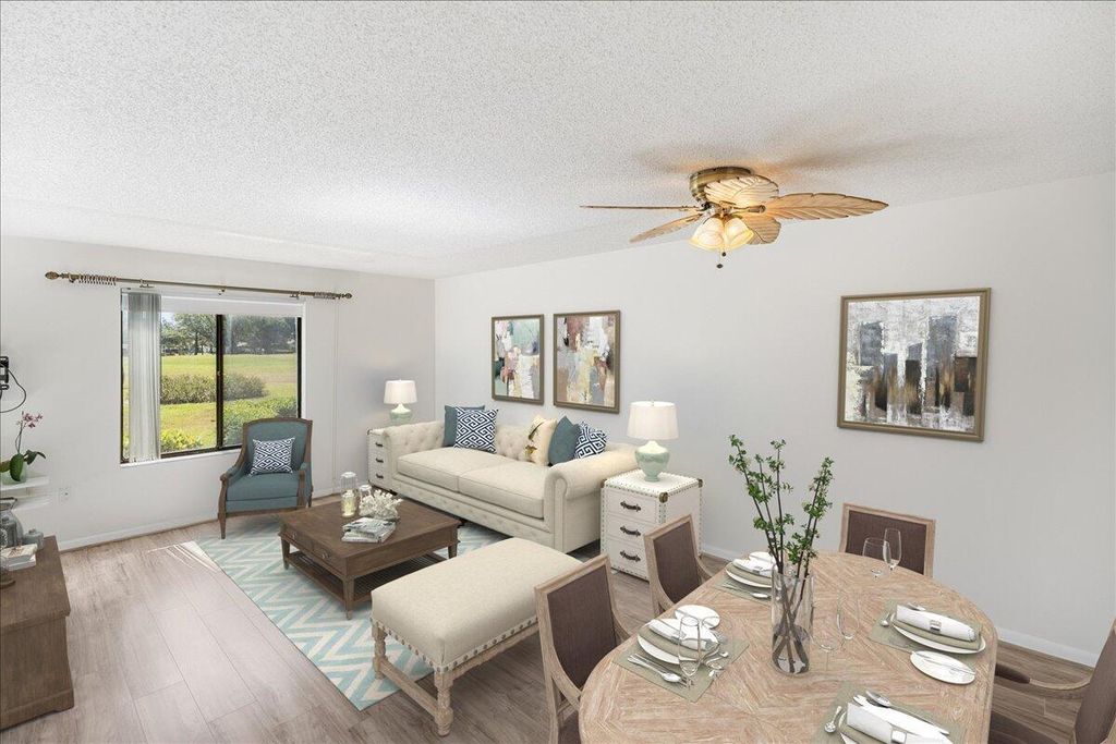 Photo of 5335 SE Miles Grant Road #H-101, Stuart, FL 34997 (MLS # R10981823)