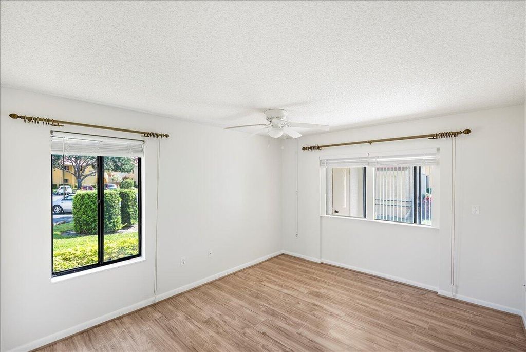 Photo of 5335 SE Miles Grant Road #H-101, Stuart, FL 34997 (MLS # R10981823)