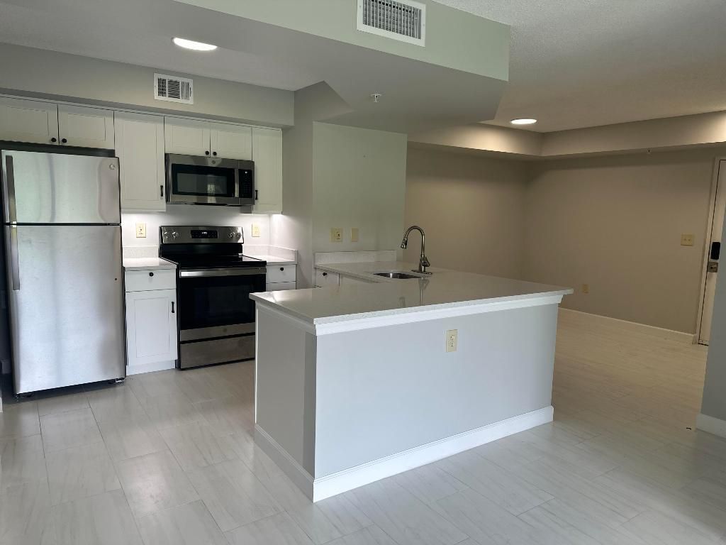Photo of 3785 NW Mediterranean Lane #2-108, Jensen Beach, FL 34957 (MLS # R10967516)