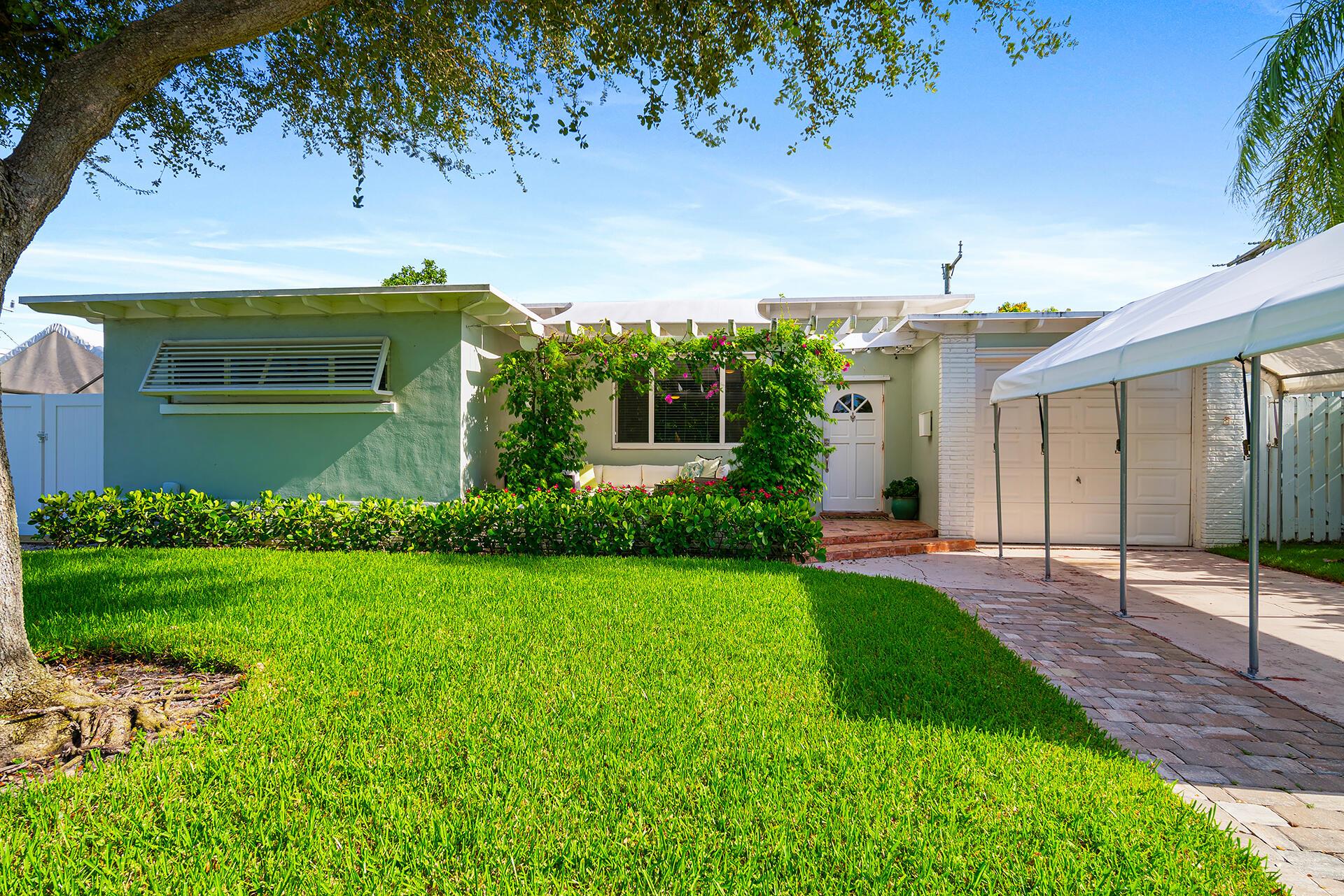 Mid-Century Charmer in Prime 'SoSo' Location! This 3BR/3BA home is one of a few properties currently listed in 'SoSo' under $2M that are east of Olive Ave on a through-street to the Intracoastal Waterway. New additions include primary suite, pool, deck, & pergola w/ shades. Other features include impact windows/doors, original wood-beamed ceilings, garage, & laundry room. Walk or bike along scenic Flagler Drive. Minutes to Palm Beach, top schools, tennis centers, golf courses, beaches, City Place, shopping, dining, Brightline, & PBI Airport. Priced to move in as-is. Surrounded by high-end development & multimillion-dollar homes, you could raze & build new. 3,100+ SF plans available for purchase &/or will build to suit--pricing available upon request.
