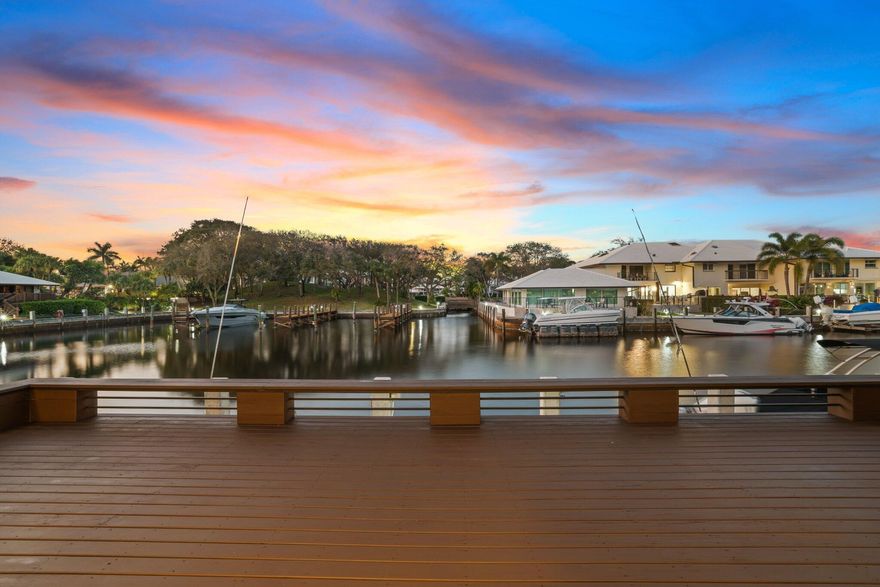 BRING YOUR BOAT TO WATERFRONT LUXURY LIVING! In a beautiful guard-gated community along the waterways, this fully reconfigured and meticulously renovated 3-Bed 3-Bath Villa awaits on a scenic tree-lined street. LUXURY REDEFINED. No detail has been spared in this home's transformation. With raised living room ceilings, recessed lighting, top-of-the-line Thermador double oven, 6-burner gas cooktop, subzero refrigerator, tankless wtr htr, extra-large LG washer & dryer, walk-in pantry, and built-in closets. Enjoy the luxury of the newly redesigned & re-built oversize deck, offering panoramic views from your 40FT PRIVATE DOCK! Sail into the sunset from your own backyard! Stunning landscaping + lighting, full house gas generator, impact windows + doors, new pavers, and more. This is a must see!