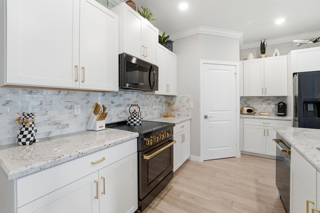 Photo of 1554 NE White Pine Terrace, Ocean Breeze, FL 34957 (MLS # B26022661)