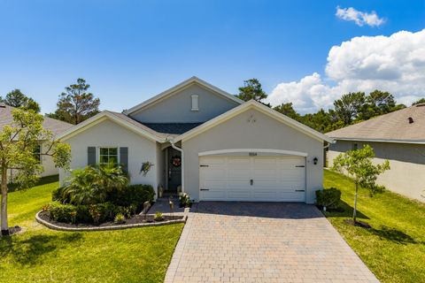 Photo of 1554 NE White Pine Terrace, Ocean Breeze, FL 34957 (MLS # B26022661)