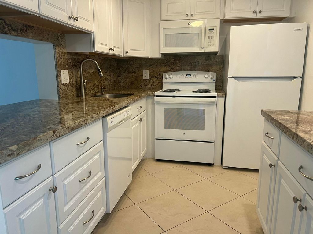 Photo of 2615 NE 3rd Court #213, Boynton Beach, FL 33435 (MLS # B26010884)