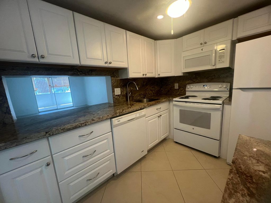 Photo of 2615 NE 3rd Court #213, Boynton Beach, FL 33435 (MLS # B26010884)