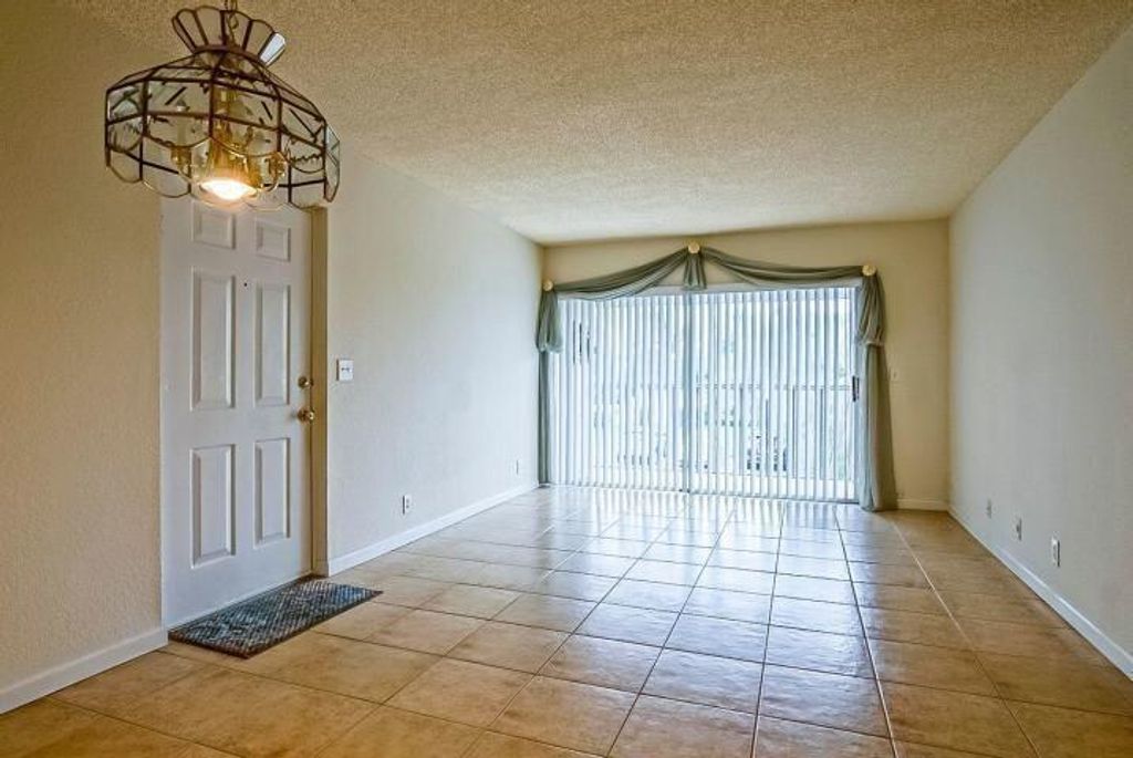 Photo of 1500 SE Royal Green Circle Circle #203, Port Saint Lucie, FL 34952 (MLS # R10938171)