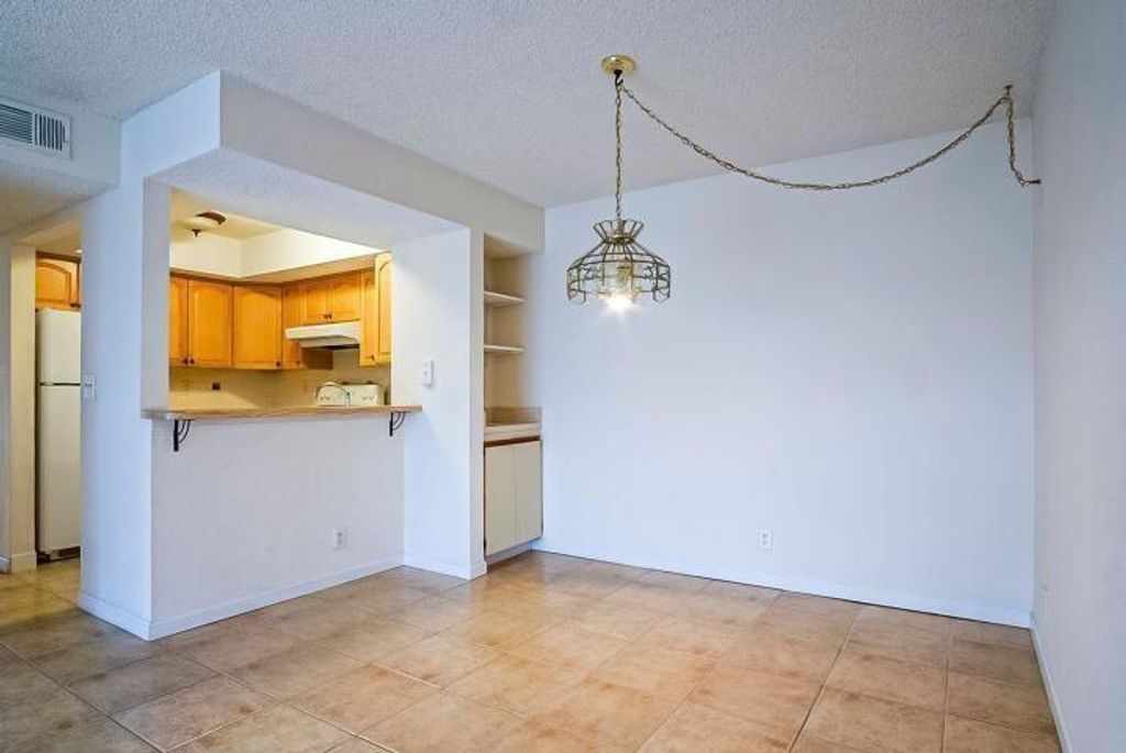 Photo of 1500 SE Royal Green Circle Circle #203, Port Saint Lucie, FL 34952 (MLS # R10938171)