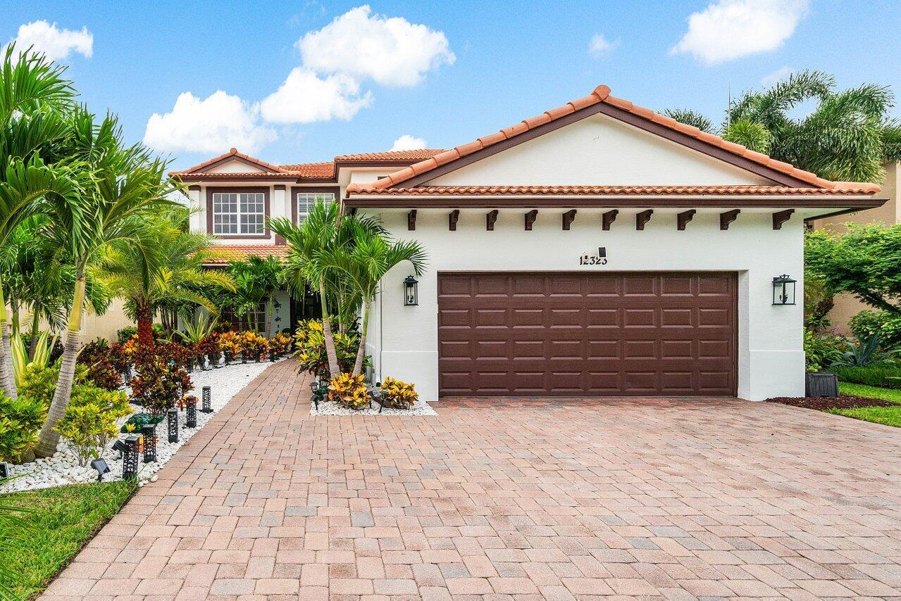 Welcome to the epitome of luxury living in the gated community of Paloma. This Mediterranean-style estate has been completely renovated from top to bottom, offering a lifestyle of unmatched comfort and sophistication. From the moment you step inside, you'll notice the seamless blend of modern elegance, with every detail thoughtfully designed.The home boasts a fully renovated kitchen, new interior paint, and all-new bathrooms enhanced with LED shower systems, creating a spa-like experience in every suite. Additional upgrades include a 2025 water heater, generator hookup, Tesla charging hook-ups, impact-rated windows and doors, and all-new lighting throughout, ensuring peace of mind as well as style.Entertain effortlessly in the open-concept living spaces, where