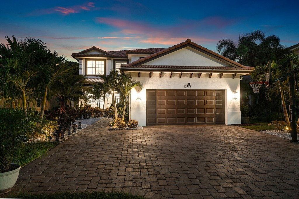 Photo of 12323 Aviles Circle, Palm Beach Gardens, FL 33418 (MLS # R11120115)